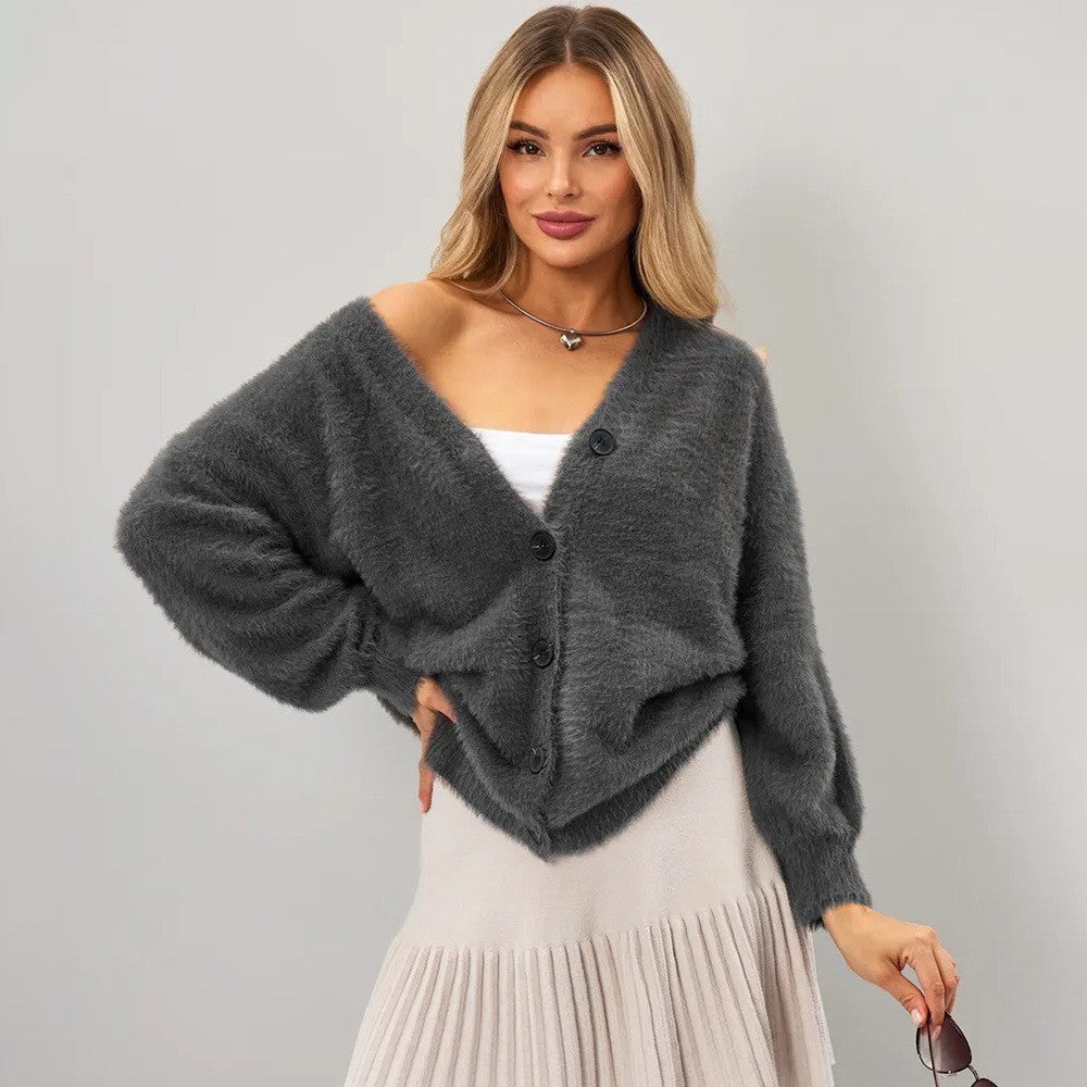 Kvinders hyggelige cardigan med asymmetrisk snit og knaplukning Stilla