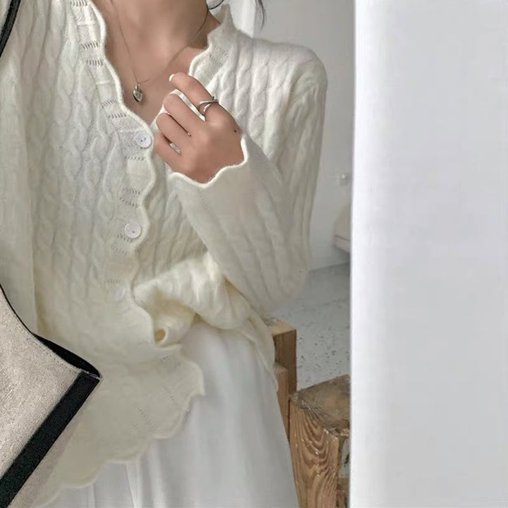 Kvindernes cardigan med struktureret kabelmønster og elegante knapdetaljer Stilla