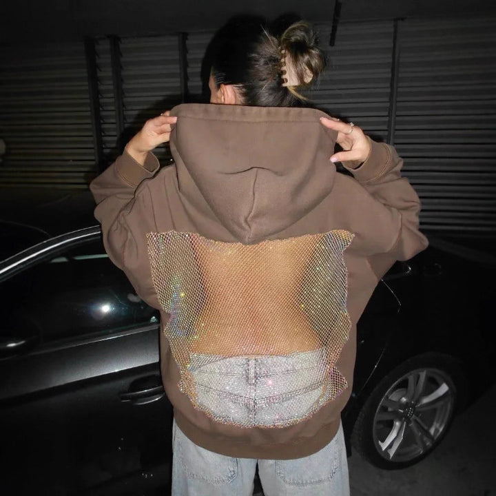 Dame med hættesweatshirt med transparent broderet rygparti Skovae