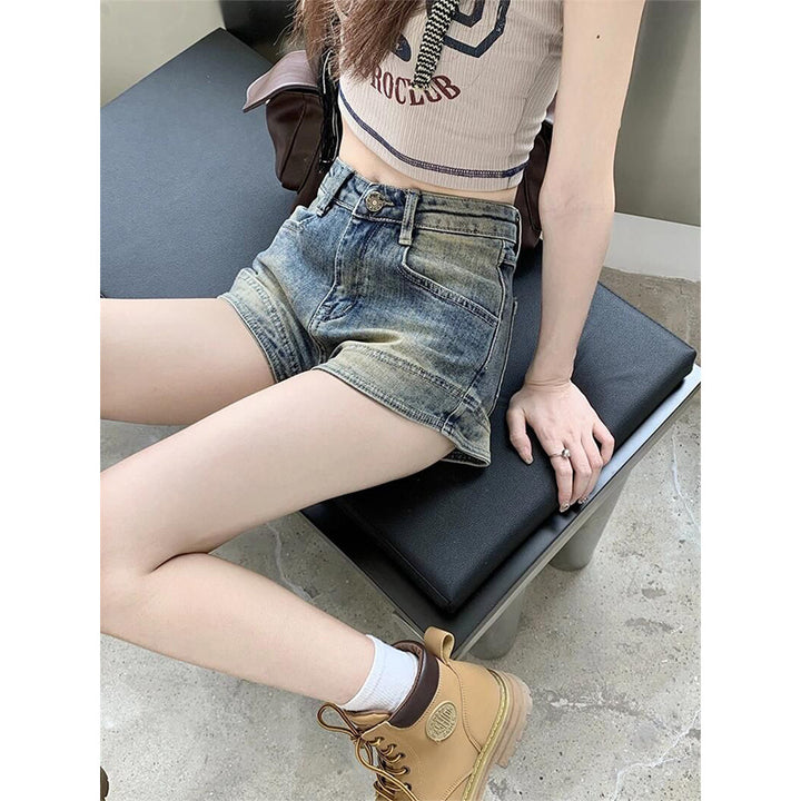 Kvinders højtaljede denim shorts med frynser