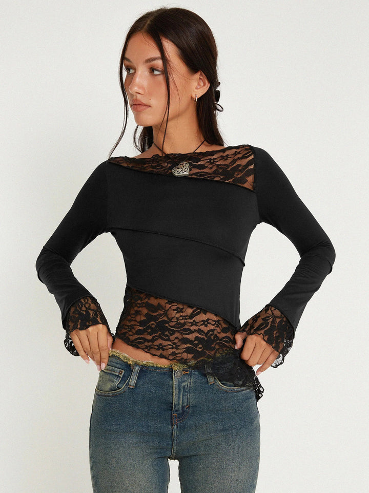 Dame top med transparente spidsdetaljer og figursyet snit Stilla