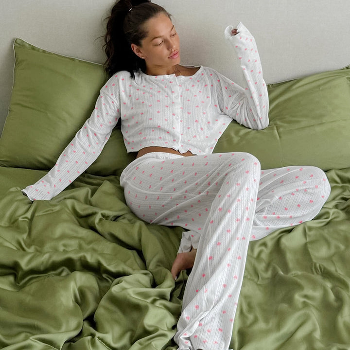 Dame luksuriøst pyjamas-sæt med stribet top og behagelige loose-fit bukser Stilla