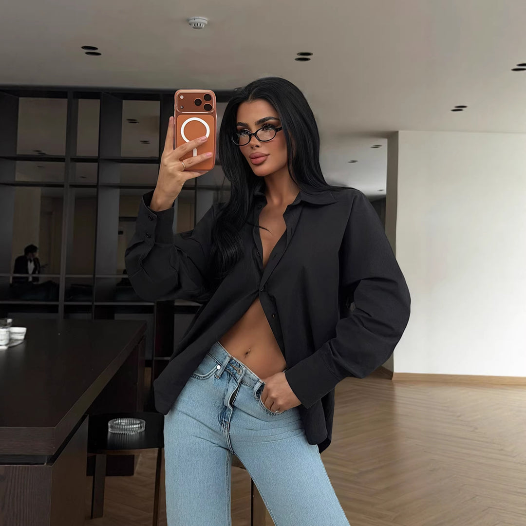 Damer elegant bluse med oversized snit og knapbar design Skovae