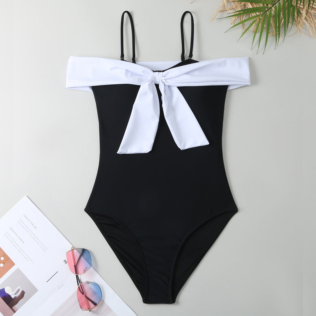 Dame one-piece badedragt med elegant indpakningsdesign og høj benåbning Skovae