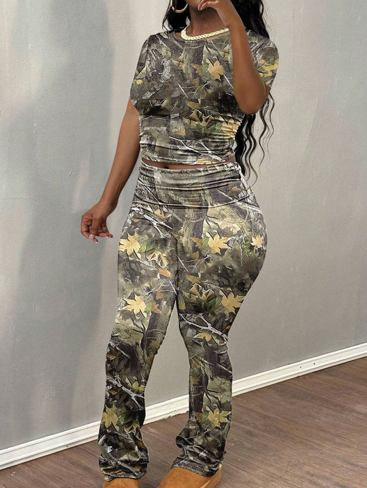 Dame fritidsdragt med floral camouflage-design Stilla
