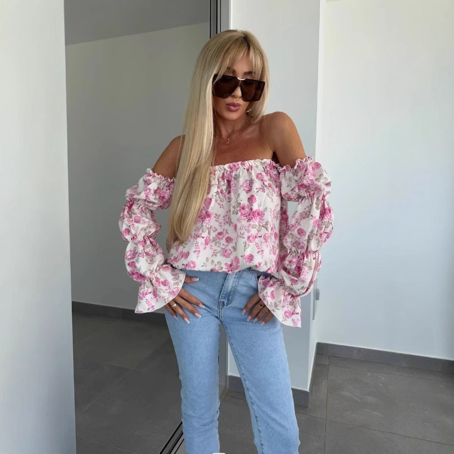 Dame Off-Shoulder Bluse med voluminiøse ærmer og floral design Stilla