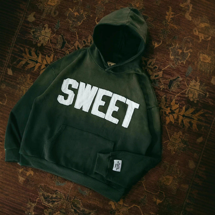 Unisex nan weit gesnit hoodies med påsyede bogstaver og kængurulomme Skovae