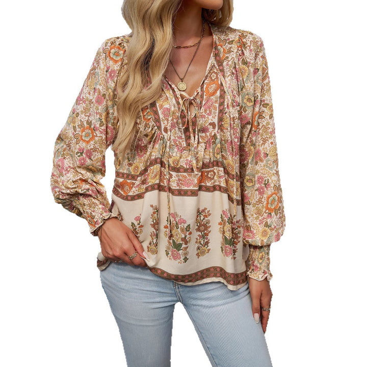 Dame Boho-stil bluse med blomsterprint og brede ærmer Stilla