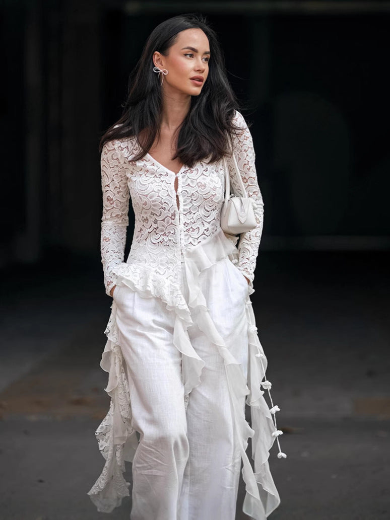 Dame chiffon-bluse med romantiske flæsedetaljer og elegant knapdesign Stilla