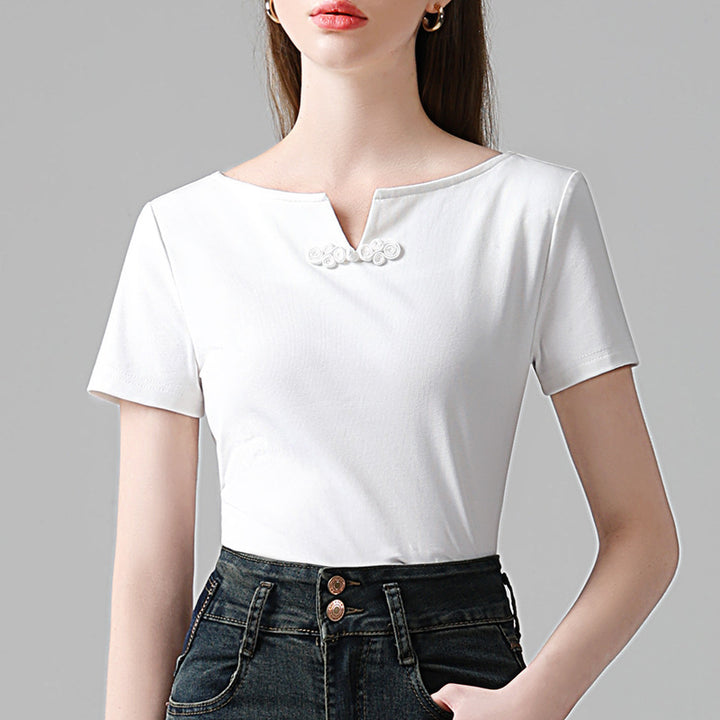 Femme elegant T-shirt med dekorativ V-udskæring og kunstnerisk knapdetalje Stilla