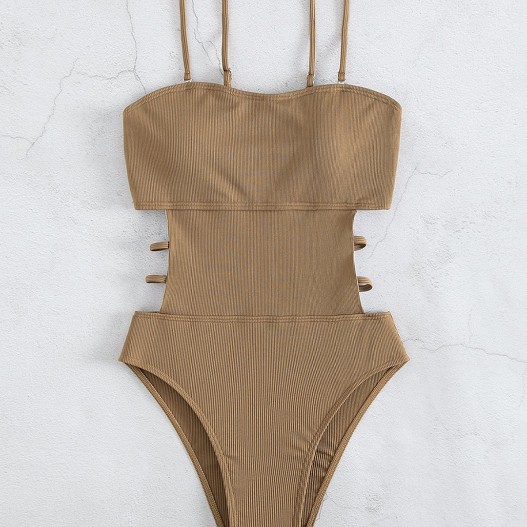 Dame one-piece badedragt med elegant schnit og sidelæns stropper Skovae