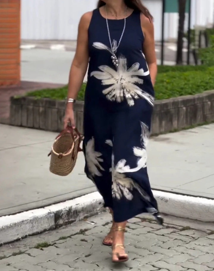 Dame maxikjole med blomsterdesign og sidelommer Stilla