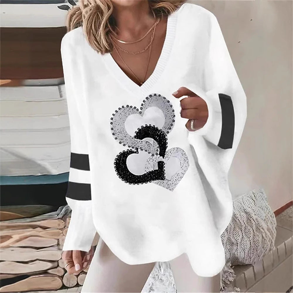 Damer V-hals sweatshirts med glitrende hjerte-motiver Stilla