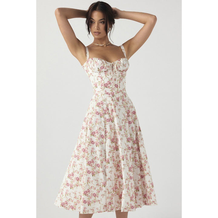 Dame maxikjole med floral design og elegant slids Skovae