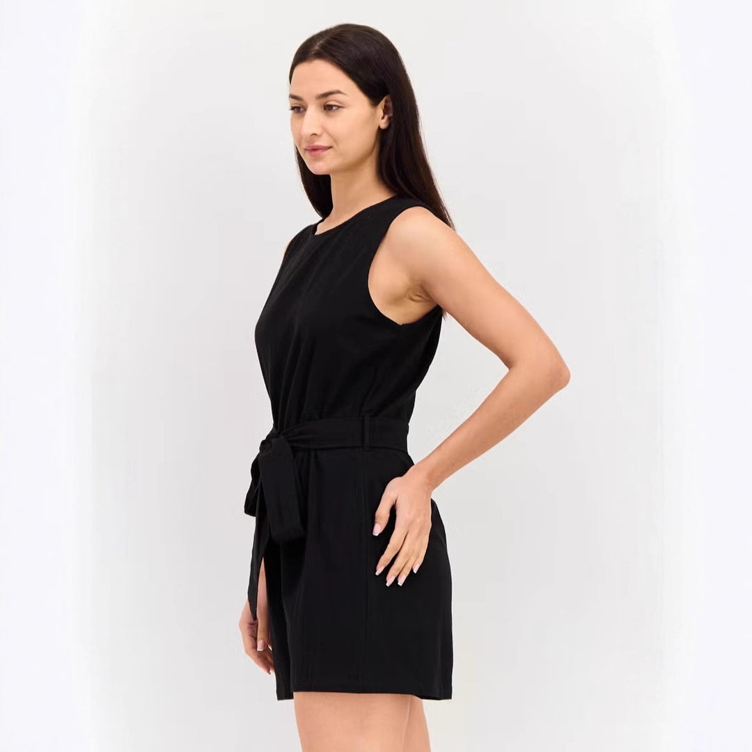 Dame jumpsuit med elegant talje og praktiske lommer Skovae