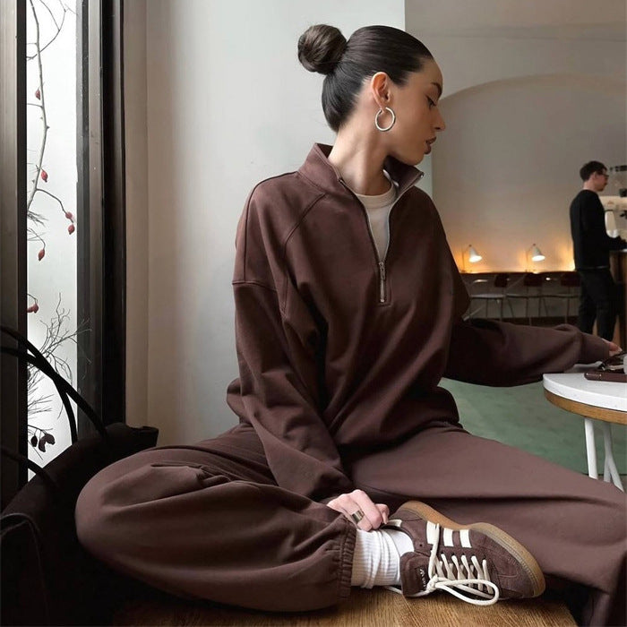 Dames sporty sweat sæt med halv lynlås og brede ben Skovae