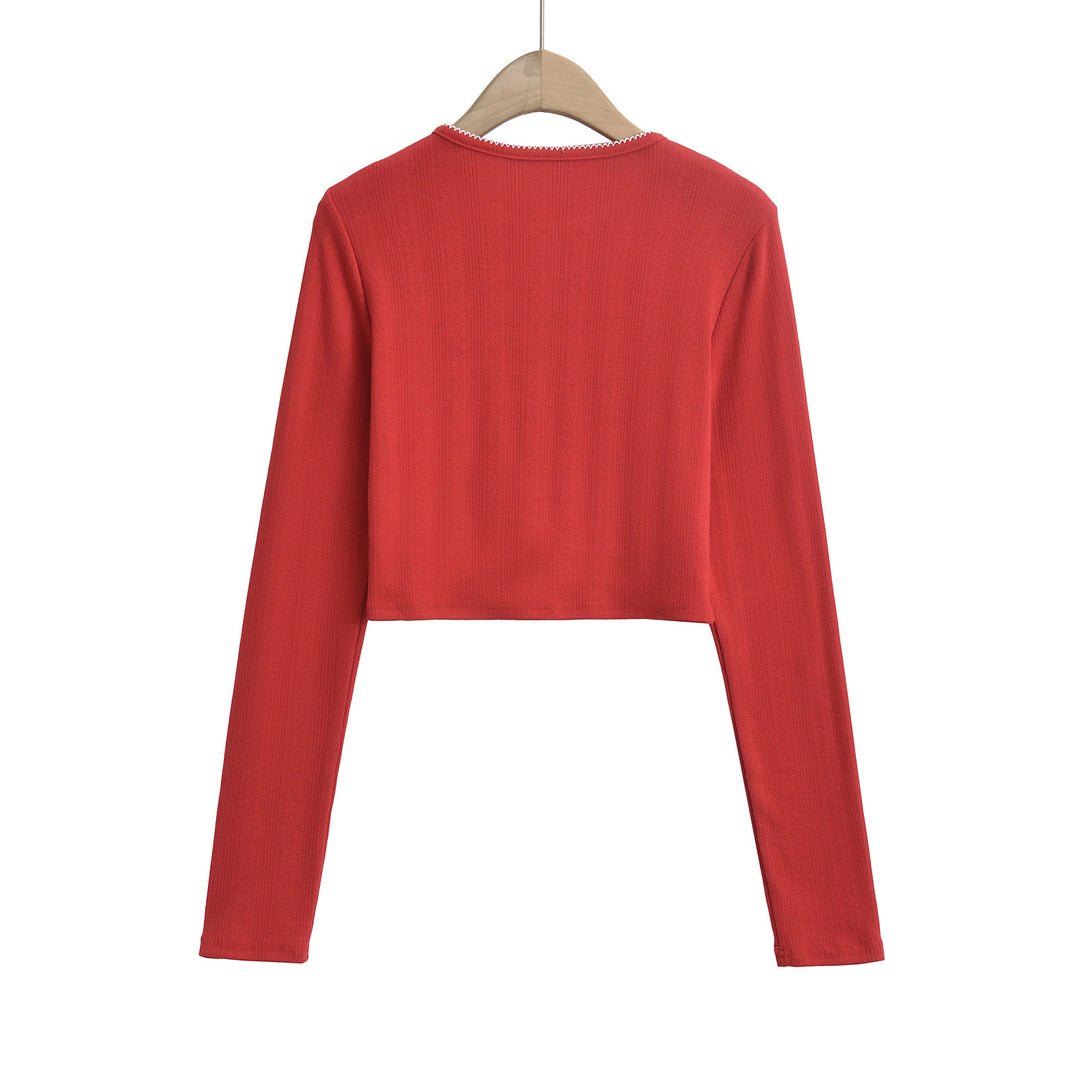 Dame Crop-top med lange ærmer og moderne knaplukning Stilla