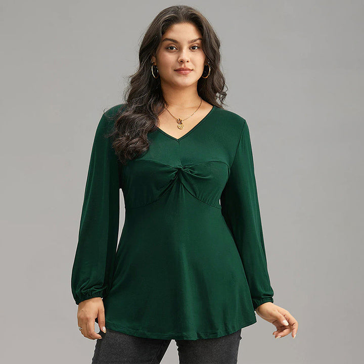 Dame elegant top med fast rynk og V-hals Stilla