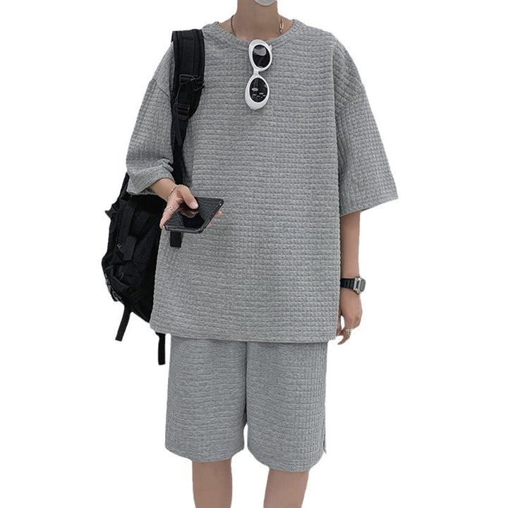 Herrer nan kvadratstruktur fritidsæt med oversized rundhalstrøje og knælange afslapningsshorts Skovae