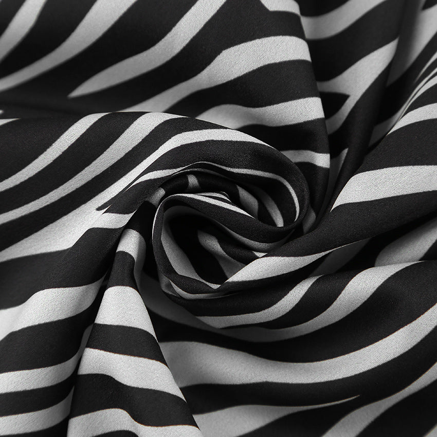 Dame fritidsdragt i moderne zebra-print med løs pasform og elastisk talje Stilla