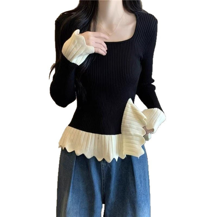 Kvinders fashionable ribstrikkede sweater med asymmetrisk kant Stilla