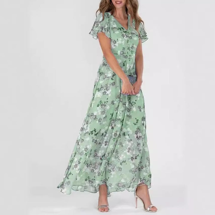 Dame maxikjole med flydende chiffon, sarte flæse detaljer og blomstrende mønster Stilla