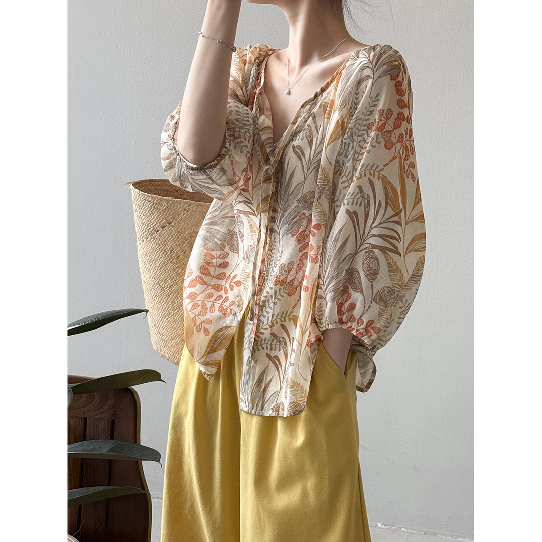 Damebluse med blomstertryk og justerbart bindingbånd Stilla