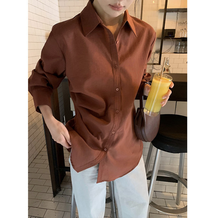 Dame langærmet bluse med innovativ rynkning og elegante knapdetaljer Stilla