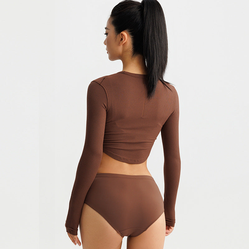 Damer mode Langærmet Crop-Top i elastisk ribmateriale med rund halsudskæring Stilla