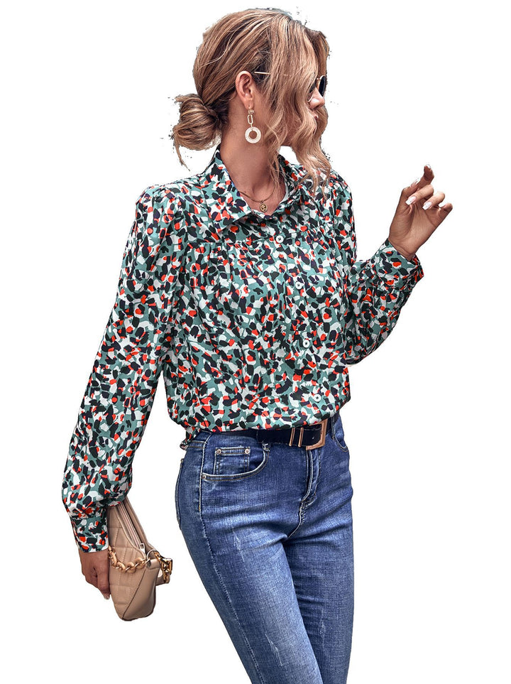 Kvinde top med blomstertryk og trendy puffærmer Stilla