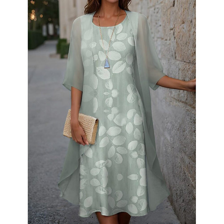 Dame elegant maxikjole med gennemsigtig chiffonoverdel og blomsterprint Stilla