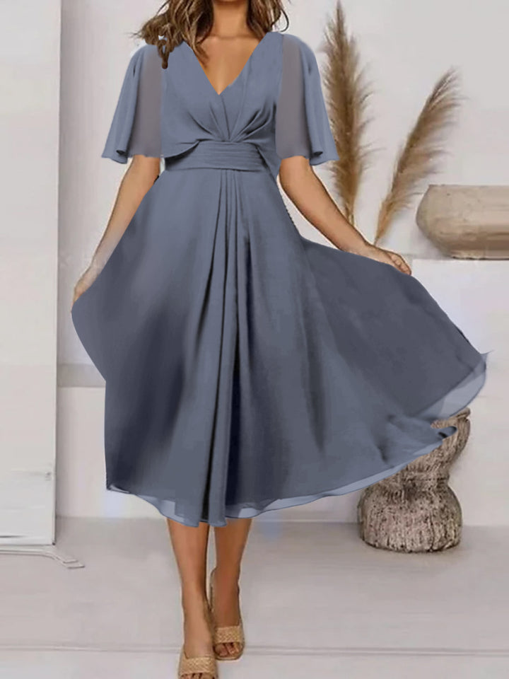 Dame Svingende Elegant Maxikjole med feminine Flæseærmer og Wrap-look Stilla
