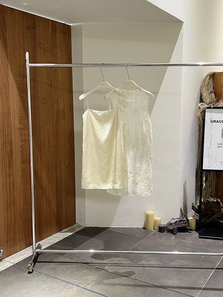 Dame Elegant ærmeløs kjole med fin broderi og luftig pasform Stilla