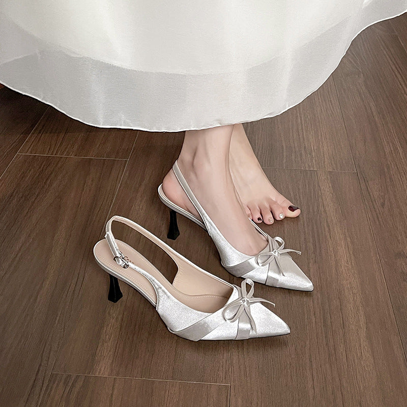 Dame Sling-Pumps med elegant sløjfedekoration og modeglans Stilla