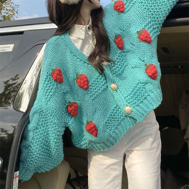Kvinders chunky strikket cardigan med dejlige blomsterapplikationer og guldknapper Stilla