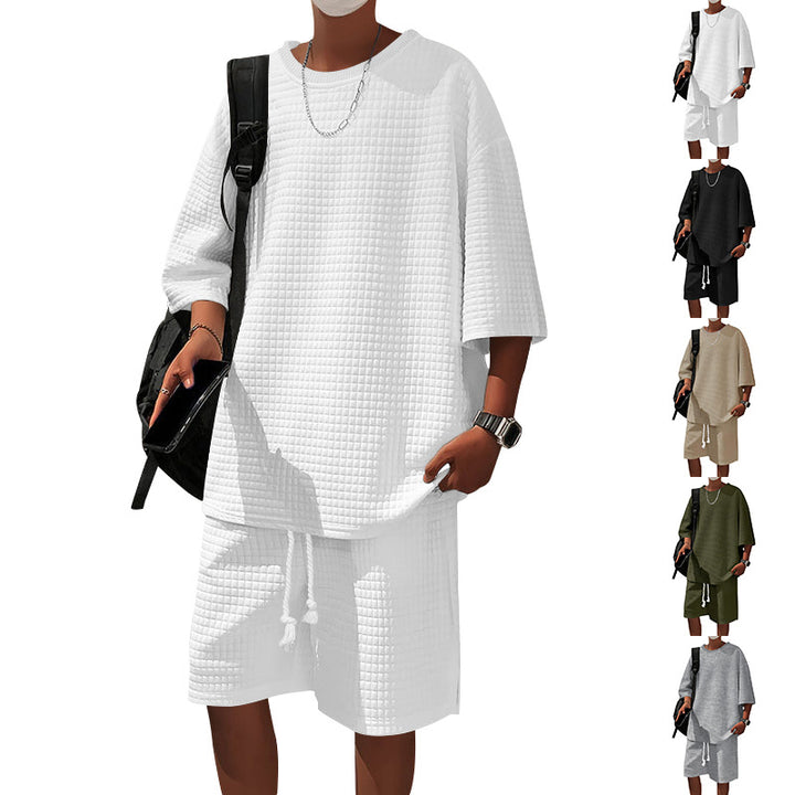 Herrer nan kvadratstruktur fritidsæt med oversized rundhalstrøje og knælange afslapningsshorts Skovae