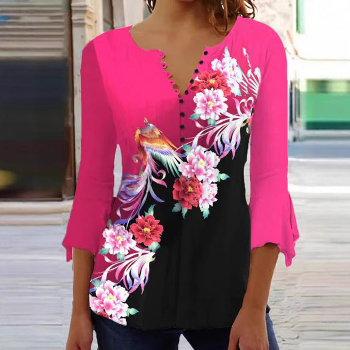 Damebluse med florale accenter og elegante knapdetaljer Stilla