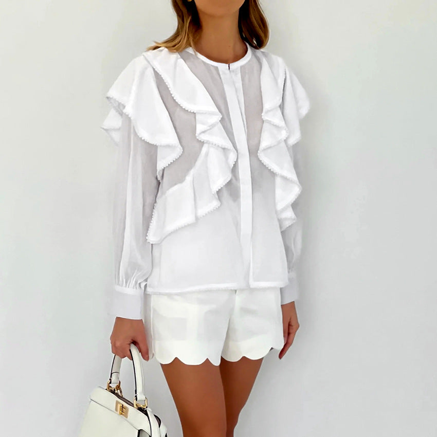 Damebluse med voluminøse flæser og elegant ståkrave Stilla