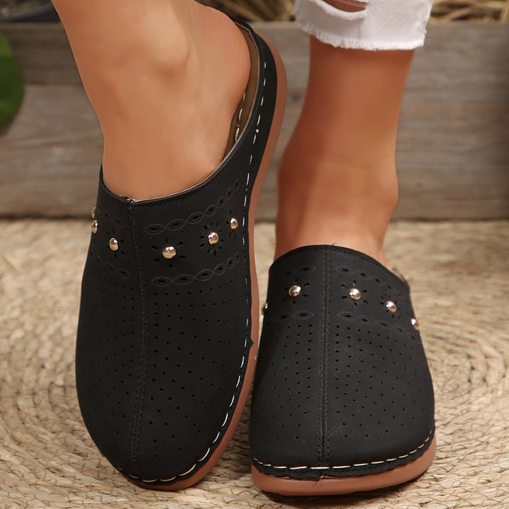 Dame Komfortable Clogs med fashionable perforeringsdesign og dekorative accenter Stilla