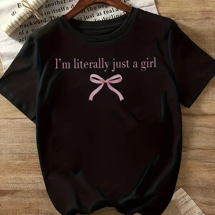 Dame T-shirt med sødt sløjfedesign og inspirerende citat Stilla