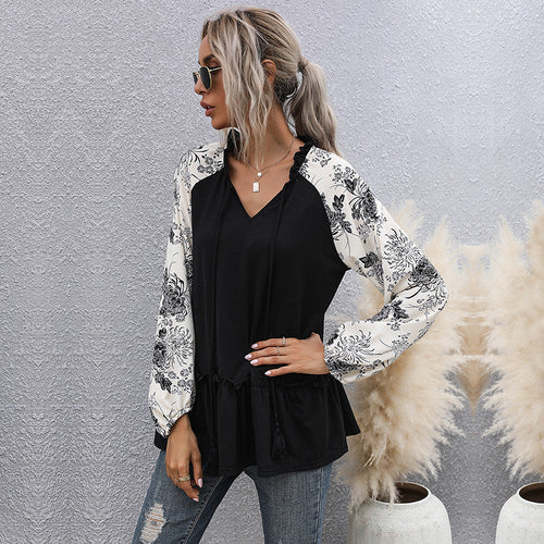 Dame hoodie med blomsterdesign og peplum snit Skovae
