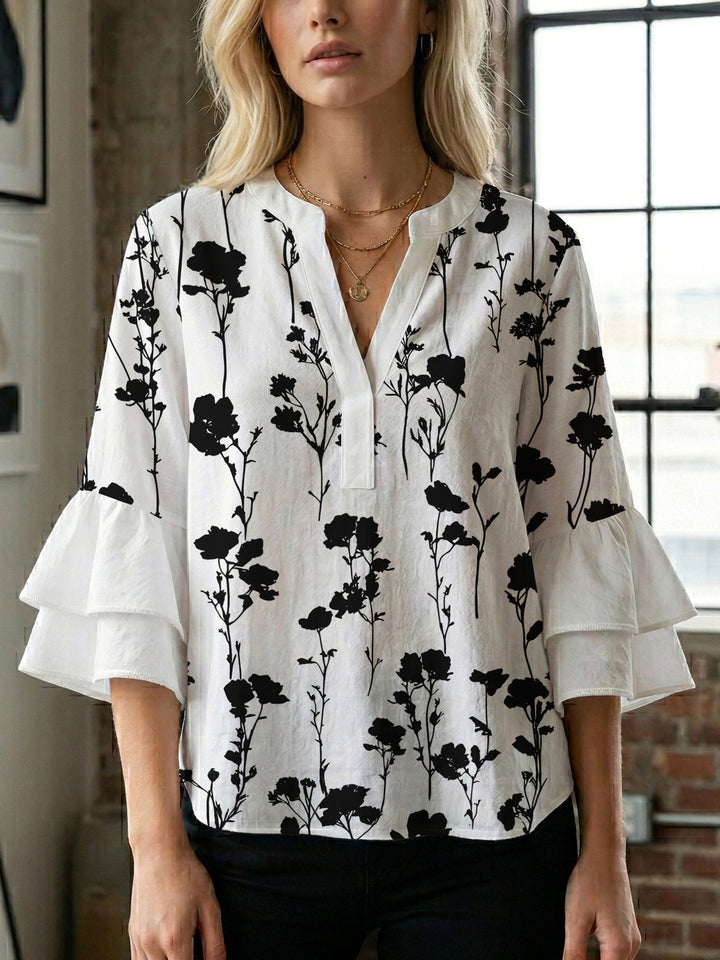 Dame afslappet bluse med flæseærmer og botanisk print Skovae