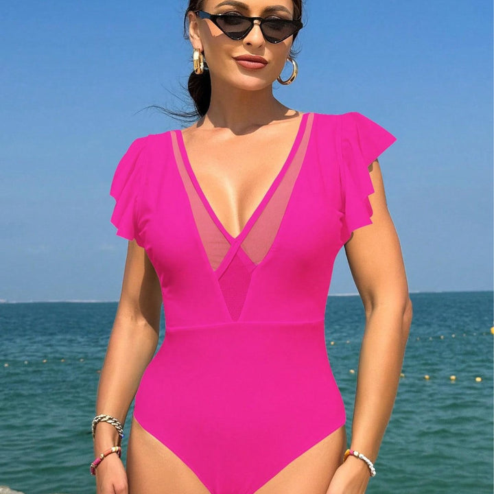 Dame one-piece badedragt med elegante flæser og dyb V-udskæring Skovae