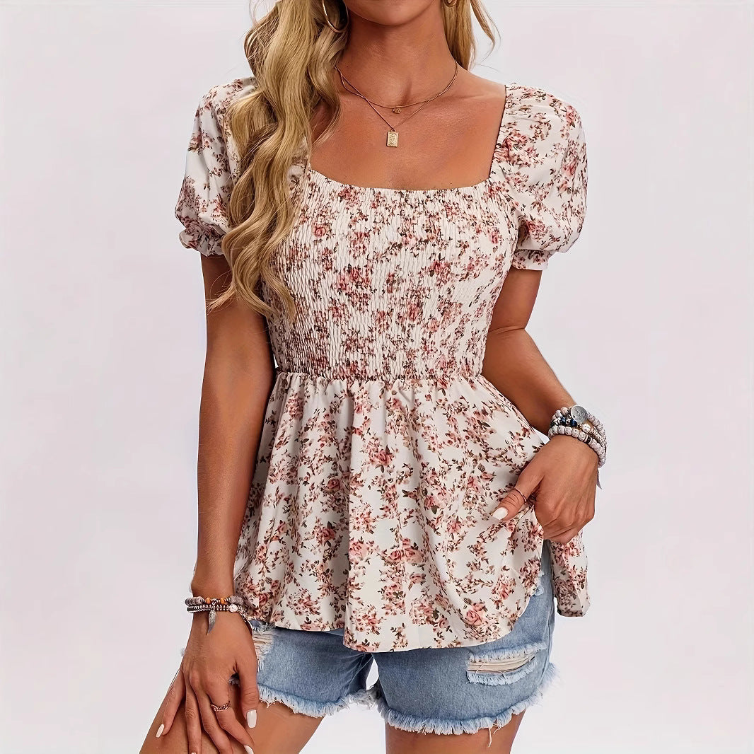 Dame blomsterprint bluse med puffærmer og rynket overdel Stilla