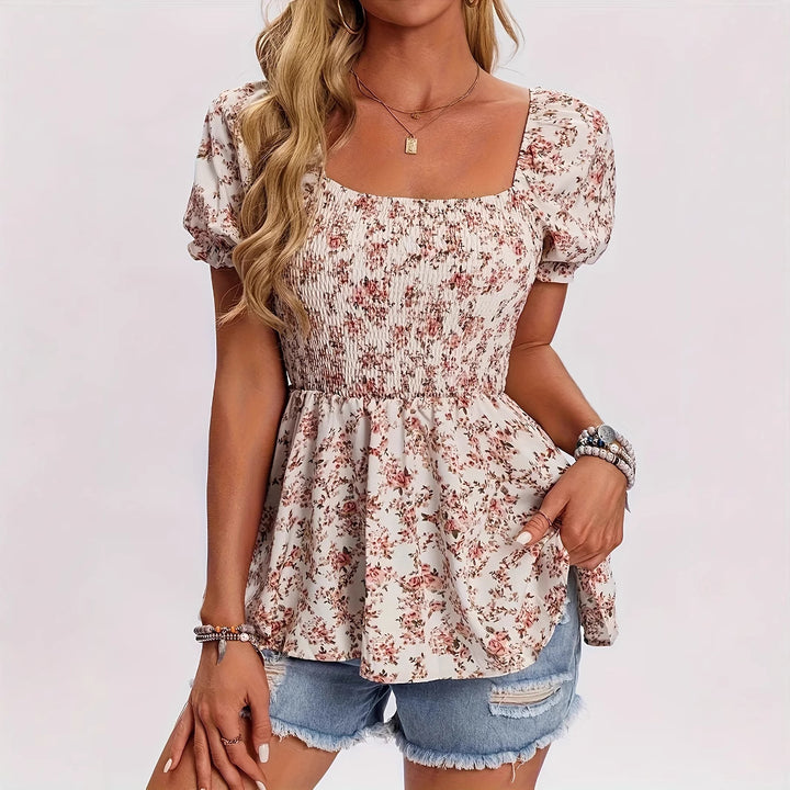 Dame blomsterprint bluse med puffærmer og rynket overdel Stilla