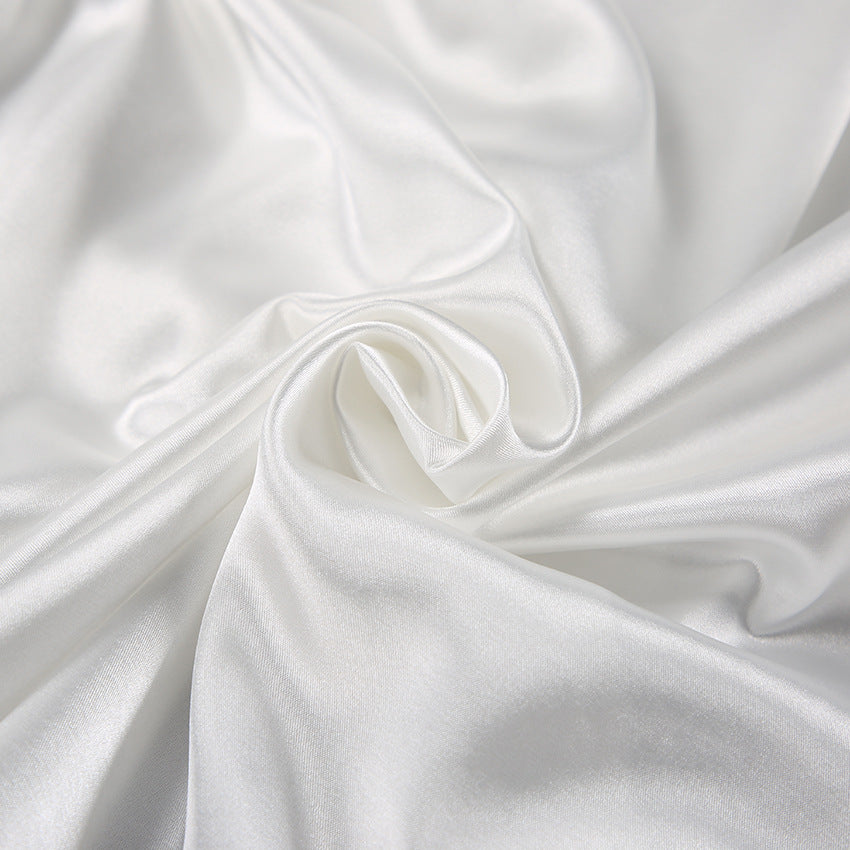 Dame Satin Pyjamas Sæt med elegant knaplukning og løstsiddende bukser Stilla