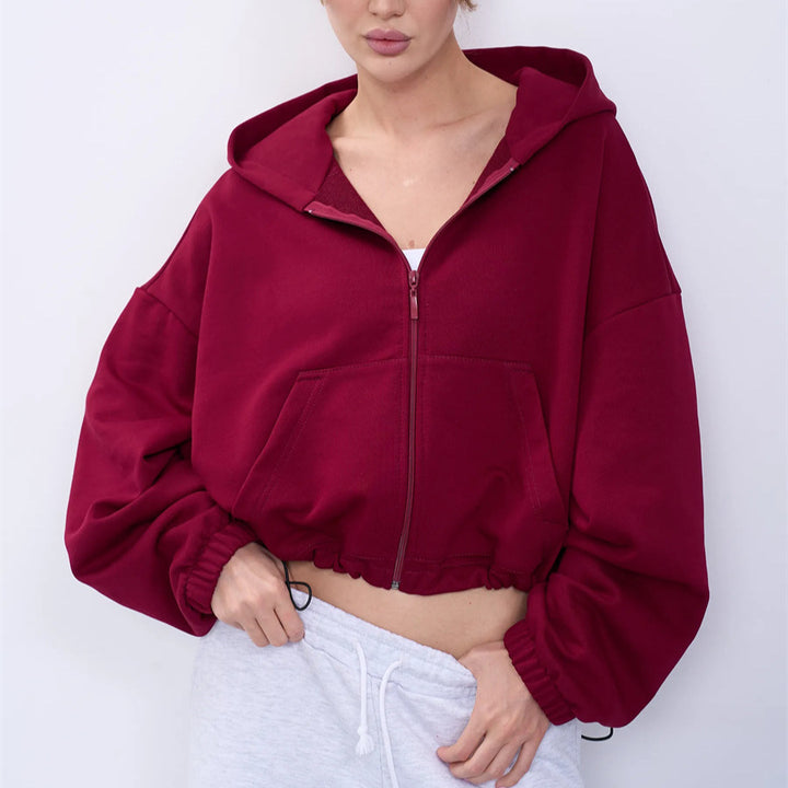Kvindernes afslappede cropped hoodie med lynlås og brede ærmer Skovae