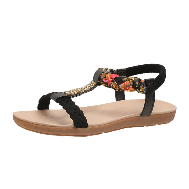 Dame sandaler i fashionable flet-design med elegante smykkedetaljer Stilla