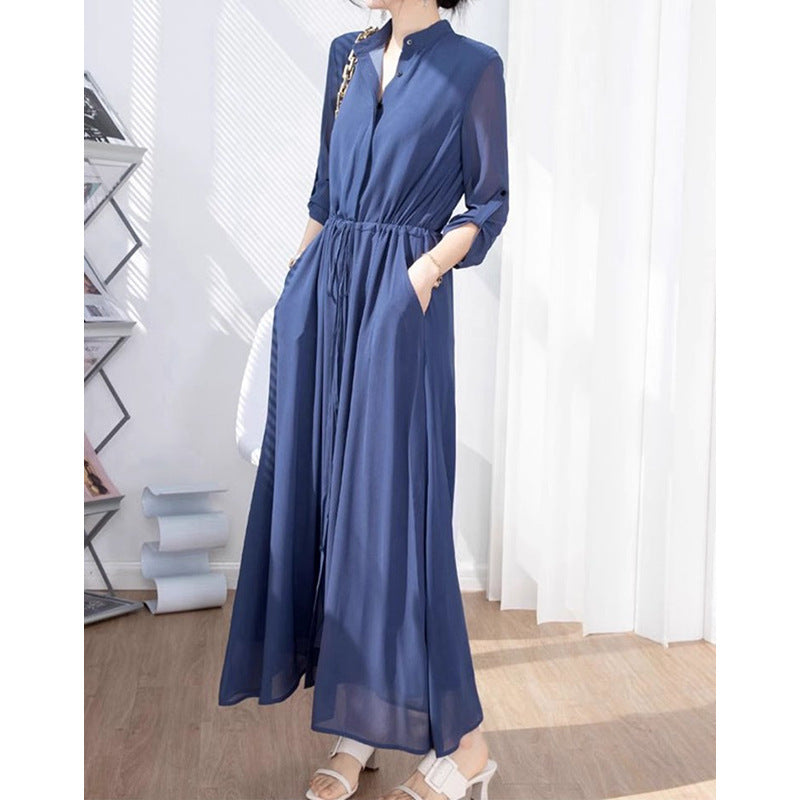 Dame stilfuld jumpsuit med elegant ståkrave og praktiske lommer Stilla