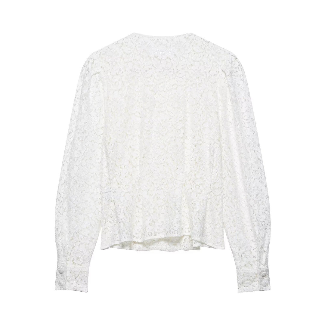 Dame spidsbluse med dekorative knapper og elegant pasform Skovae